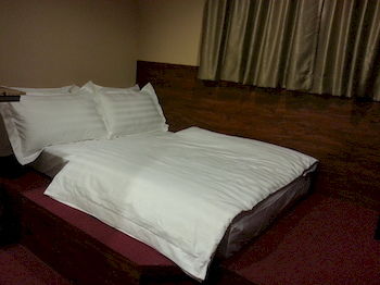 Imagen de la habitación del Hotel Shanghai. Foto 12