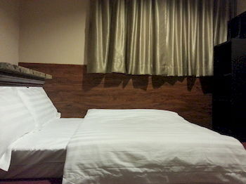 Imagen de la habitación del Hotel Shanghai. Foto 13