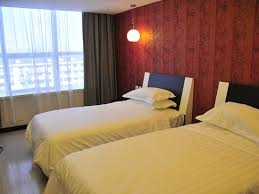 Imagen de la habitación del Hotel Shanghai Fairyland Chain. Foto 2