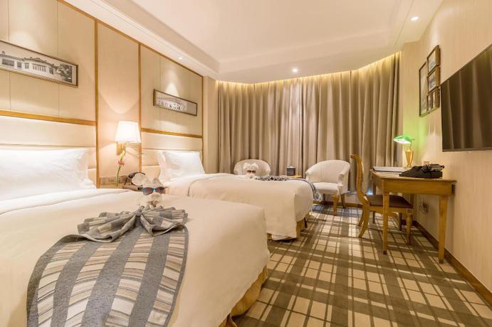 Imagen de la habitación del Hotel Shanghai Fliport Garden. Foto 12