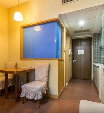 Imagen de la habitación del Hotel Shanghai Friendship Apartment. Foto 5