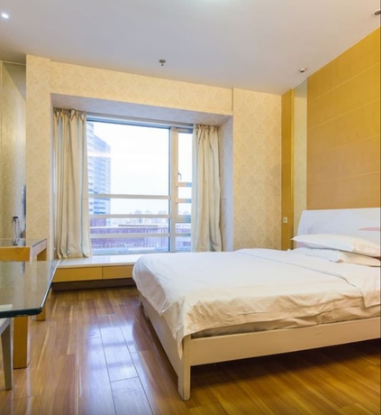 Imagen de la habitación del Hotel Shanghai Friendship Apartment. Foto 6