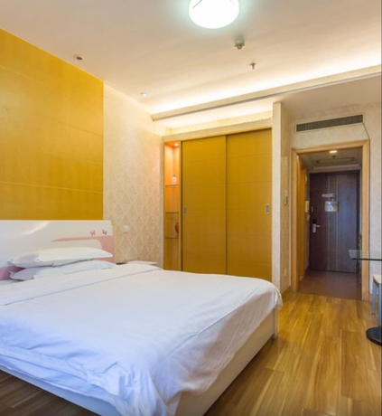 Imagen de la habitación del Hotel Shanghai Friendship Apartment. Foto 7