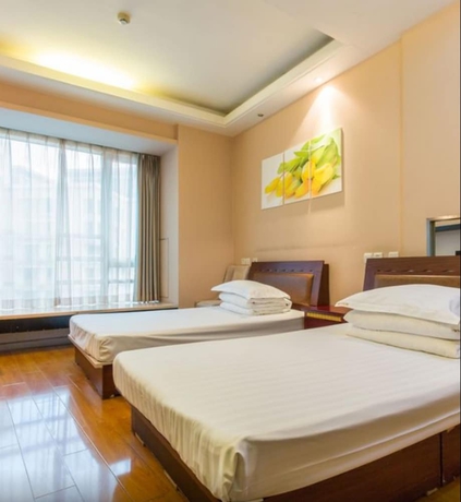 Imagen de la habitación del Hotel Shanghai Friendship Apartment. Foto 9