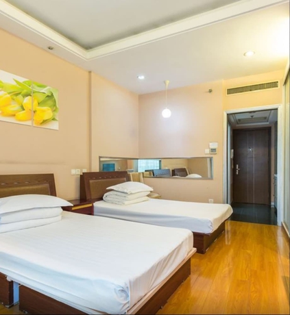 Imagen de la habitación del Hotel Shanghai Friendship Apartment. Foto 10