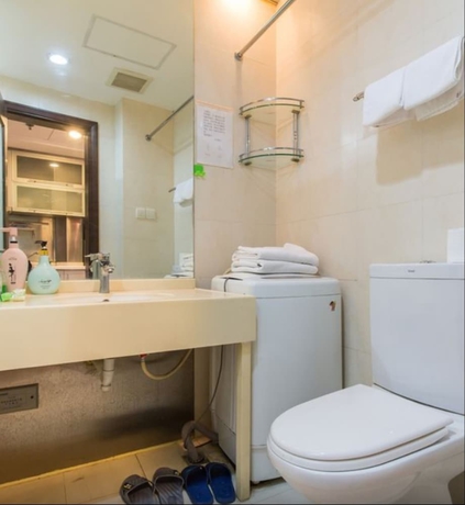 Imagen de la habitación del Hotel Shanghai Friendship Apartment. Foto 13