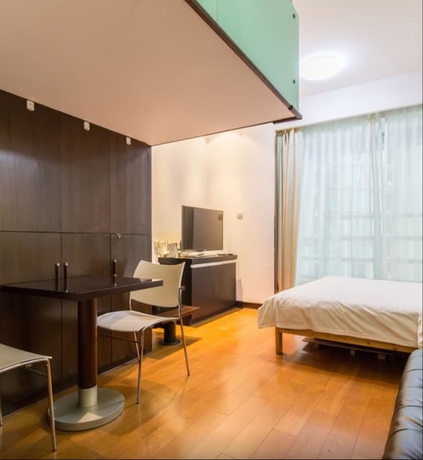 Imagen de la habitación del Hotel Shanghai Friendship Apartment. Foto 14