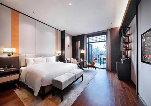 Imagen de la habitación del Hotel Shanghai Guang Fulin Prime. Foto 18