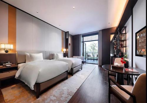 Imagen de la habitación del Hotel Shanghai Guang Fulin Prime. Foto 19