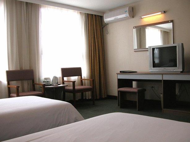 Imagen de la habitación del Hotel Shanghai Han Ting Hotel. Foto 3