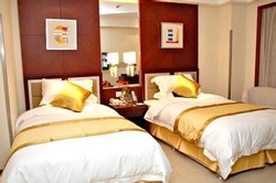 Imagen de la habitación del Hotel Shanghai Hhuhua International Hotel. Foto 3