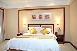 Imagen de la habitación del Hotel Shanghai Hhuhua International Hotel. Foto 4