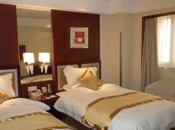 Imagen de la habitación del Hotel Shanghai Hhuhua International Hotel. Foto 5