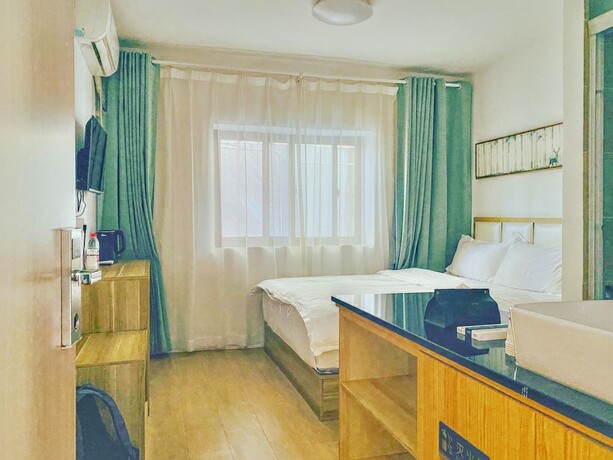 Imagen de la habitación del Hotel Shanghai Hidden Garden International Youth Hostel. Foto 19
