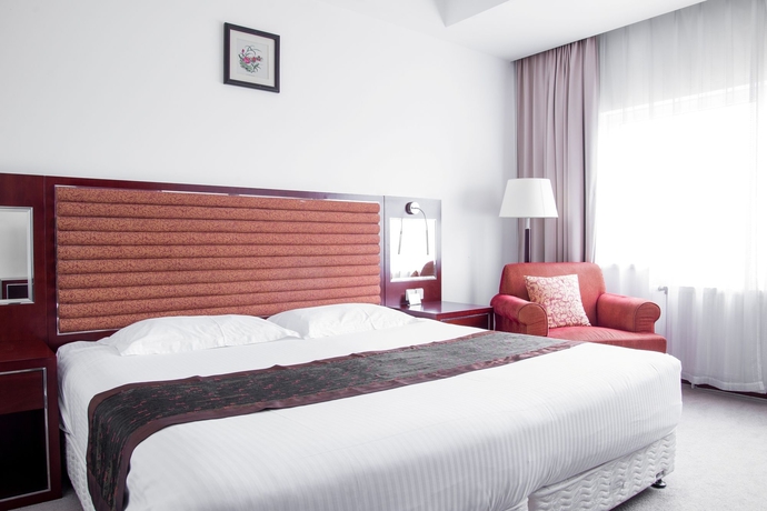 Imagen de la habitación del Hotel Shanghai Holland. Foto 7