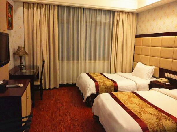 Imagen de la habitación del Hotel Shanghai Hongjin International. Foto 17