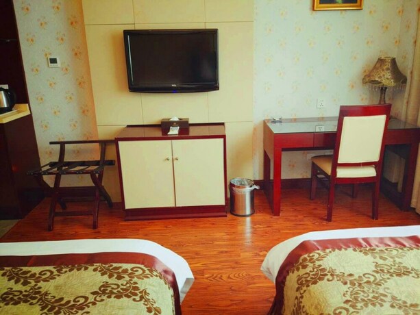 Imagen de la habitación del Hotel Shanghai Hongjin International. Foto 18
