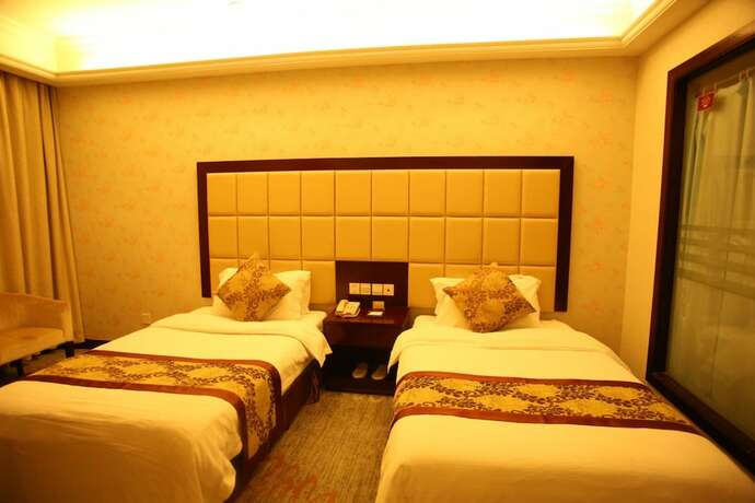 Imagen de la habitación del Hotel Shanghai Hongjin International. Foto 19