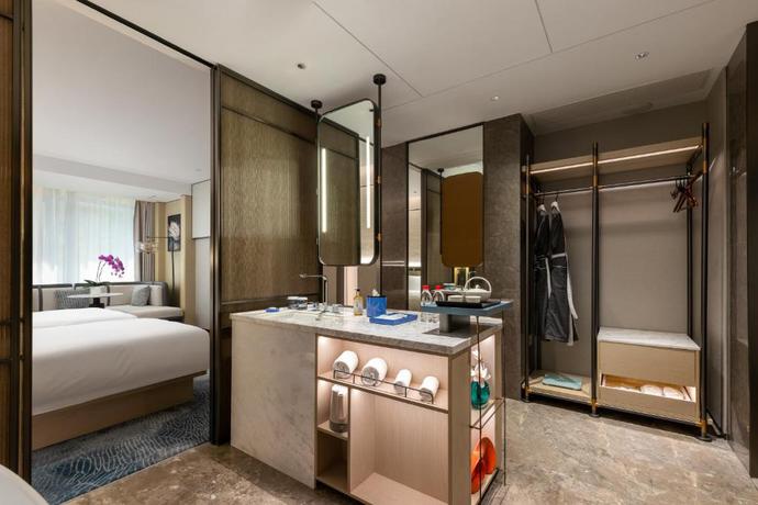 Imagen de la habitación del Hotel Shanghai Hongqiao Heyitang. Foto 5