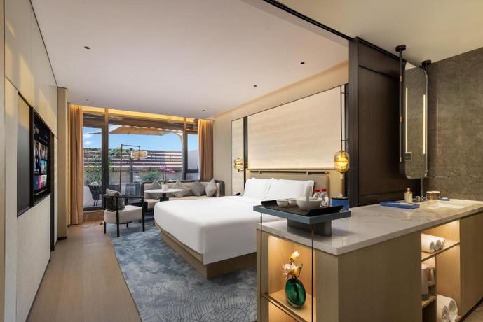 Imagen de la habitación del Hotel Shanghai Hongqiao Heyitang. Foto 6