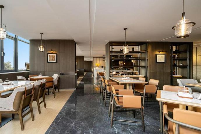 Imagen del bar/restaurante del Hotel Shanghai Hongqiao Heyitang. Foto 4