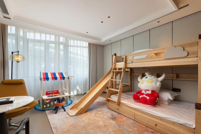 Imagen de la habitación del Hotel Shanghai Hongqiao Heyitang. Foto 11