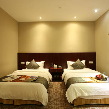 Imagen de la habitación del Hotel Shanghai Hongqiao Huangxin International. Foto 9