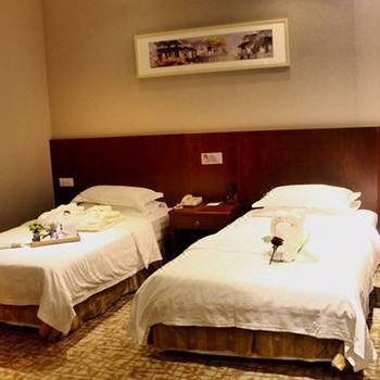 Imagen de la habitación del Hotel Shanghai Hongqiao Huangxin International. Foto 13