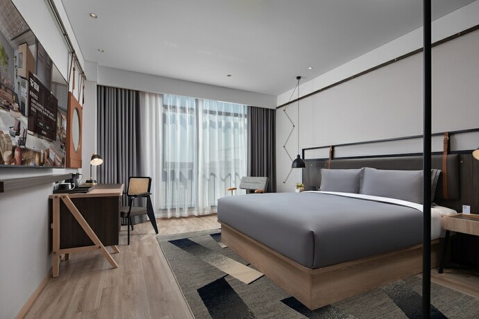 Imagen de la habitación del Hotel Shanghai Hongqiao Tongpai. Foto 12