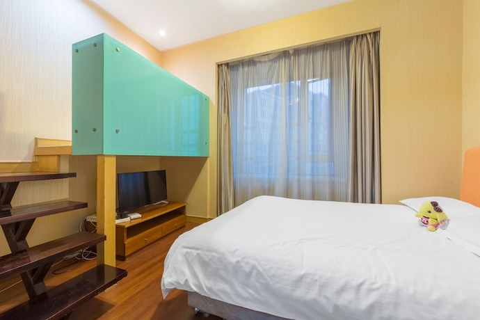 Imagen de la habitación del Hotel Shanghai Jiarong Apartment. Foto 3