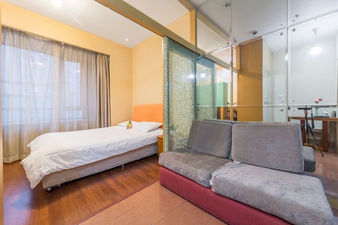 Imagen de la habitación del Hotel Shanghai Jiarong Apartment. Foto 7