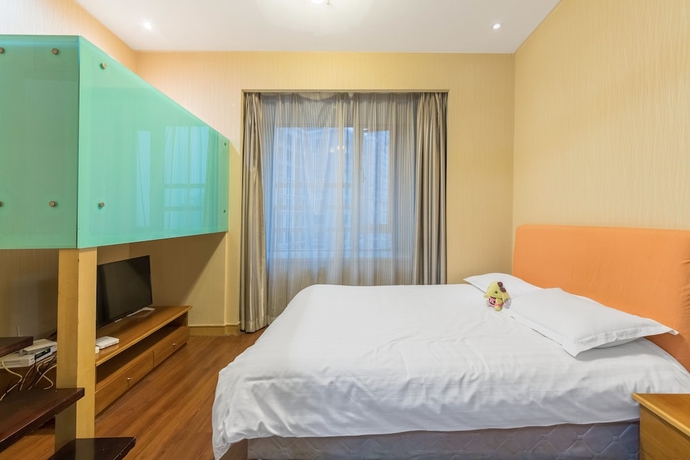 Imagen de la habitación del Hotel Shanghai Jiarong Apartment. Foto 11