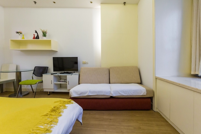 Imagen de la habitación del Hotel Shanghai Jiarong Apartment. Foto 12