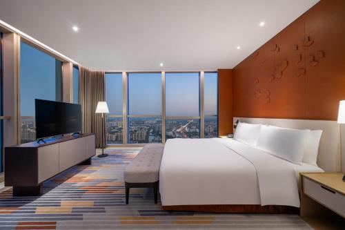 Imagen de la habitación del Hotel Shanghai Jinli Qube. Foto 18