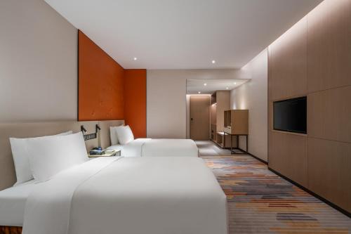 Imagen de la habitación del Hotel Shanghai Jinli Qube. Foto 20