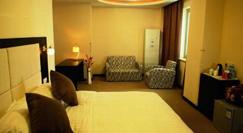 Imagen de los exteriores del Hotel Shanghai Joyful Star. Foto 10