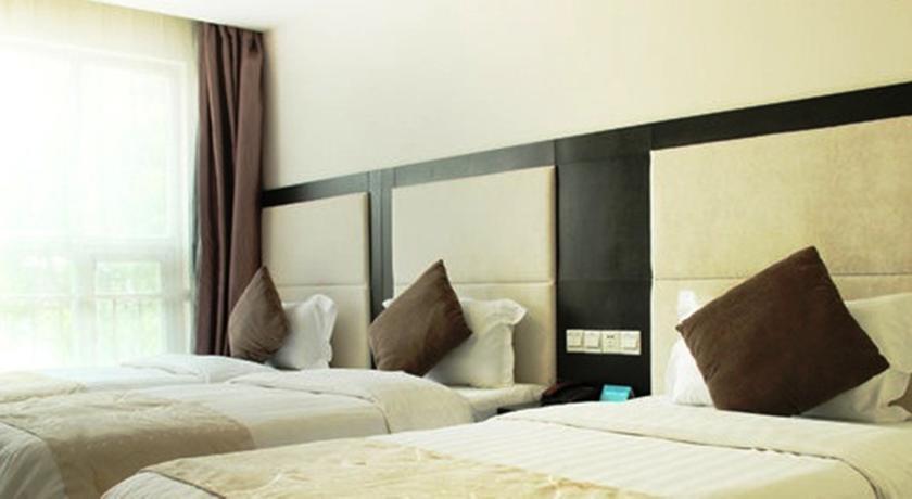 Imagen de la habitación del Hotel Shanghai Joyful Star. Foto 4