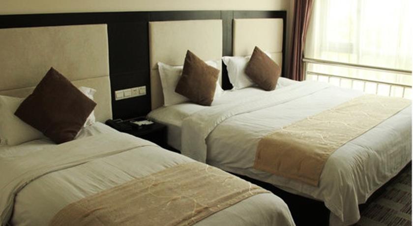 Imagen de la habitación del Hotel Shanghai Joyful Star. Foto 5