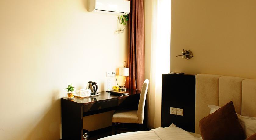 Imagen de la habitación del Hotel Shanghai Joyful Star. Foto 6