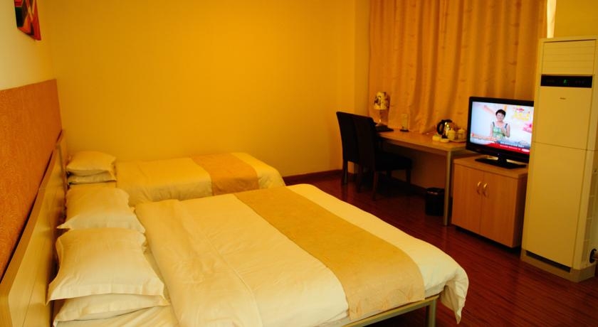 Imagen de la habitación del Hotel Shanghai Joyful Yard. Foto 4