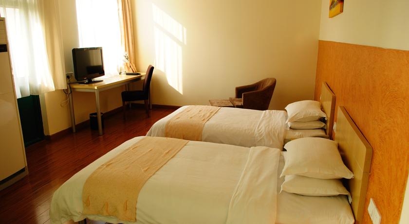 Imagen de la habitación del Hotel Shanghai Joyful Yard. Foto 5