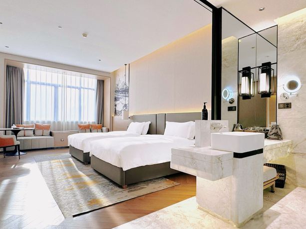 Imagen de la habitación del Hotel Shanghai Kacunm. Foto 1