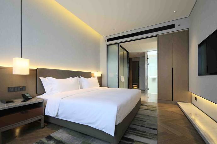 Imagen de la habitación del Hotel Shanghai Kacunm. Foto 2