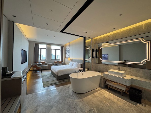 Imagen de la habitación del Hotel Shanghai Kacunm. Foto 5