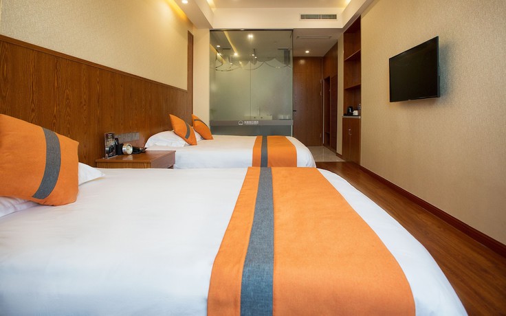Imagen de la habitación del Hotel Shanghai Linyin Holiday. Foto 5