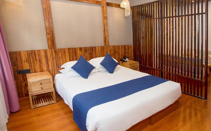 Imagen de la habitación del Hotel Shanghai Linyin Holiday. Foto 9