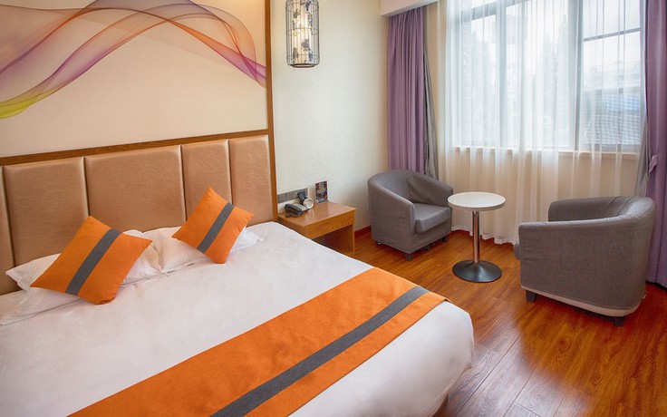 Imagen de la habitación del Hotel Shanghai Linyin Holiday. Foto 11