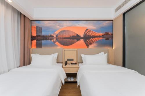 Imagen general del Hotel Shanghai Manhua-Provides free shuttle service to Disneyland. Foto 2