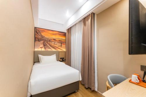 Imagen general del Hotel Shanghai Manhua-Provides free shuttle service to Disneyland. Foto 4
