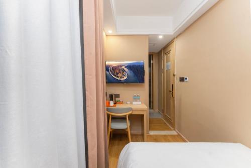 Imagen general del Hotel Shanghai Manhua-Provides free shuttle service to Disneyland. Foto 5
